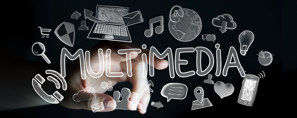 Symbolbild für Multmedia (Man sieht eine Hand vor schwarzem Hintergrund, die Zeige- und Mittelfinger ausstreckt. Davor befinden sich der Schriftzug Multimedia sowie diverse Icons, zum Beispiel für Telefon, E-Mail, Musik, Welt, Handy etc.)