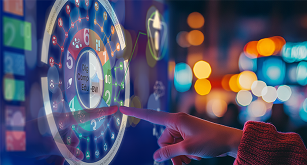 Der Zeigefinger eine Hand zeigt von rechts nach links auf ein Display, das die Symbole von DigCompEdu-BW anzeigt