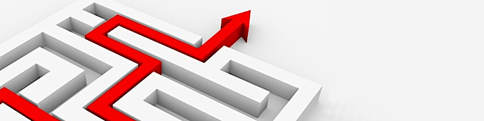 Foto: roter Pfeil führt aus einem Labyrinth